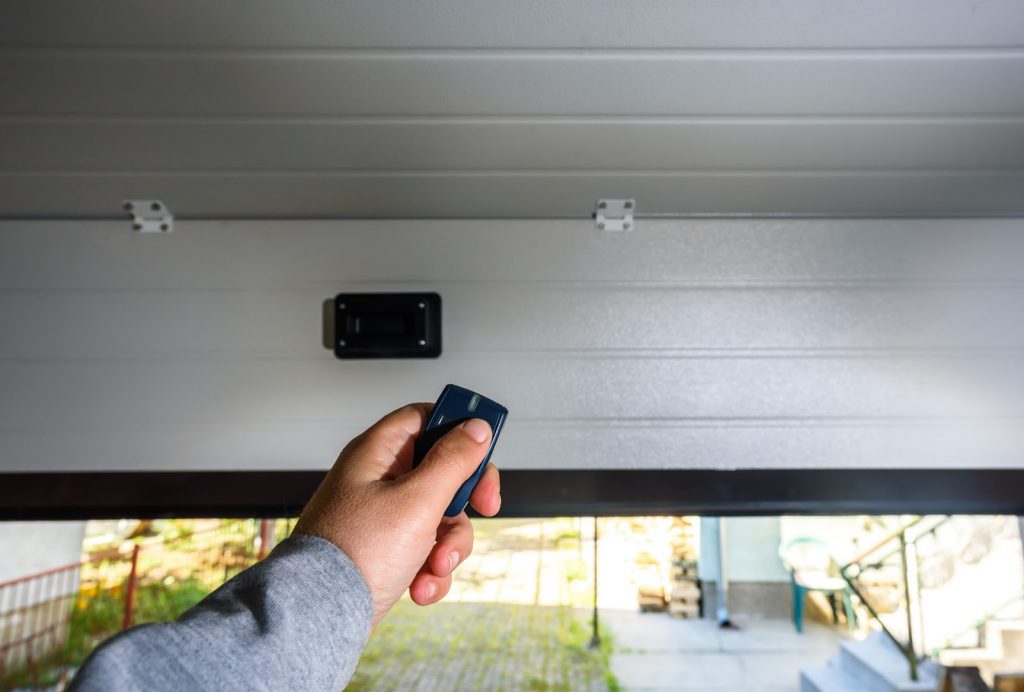 Garage-Door-Pvc-Hand-Uses-Remote-opener