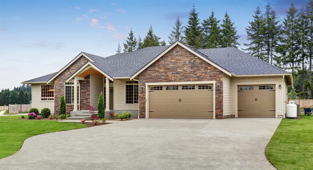 Luxury-One-Level-House-Exterior-with-Brick-Trim-Garage